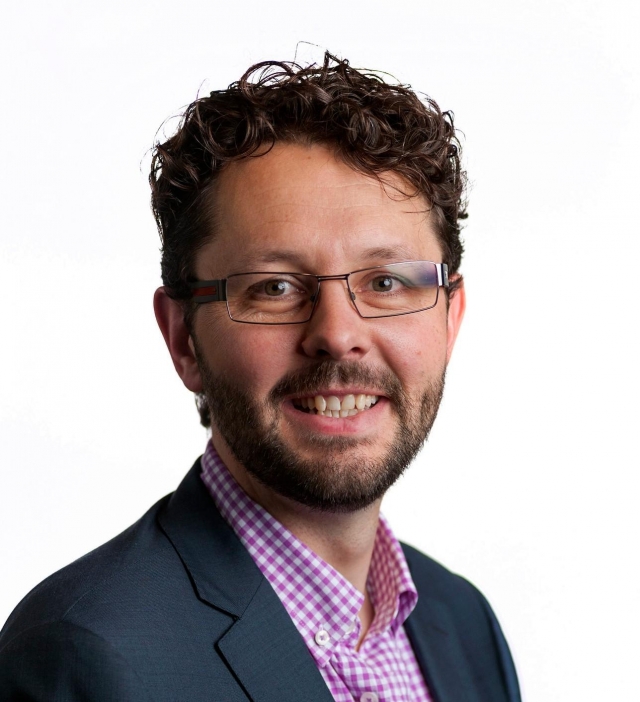 headshot of Professor Mark Hutchinson 