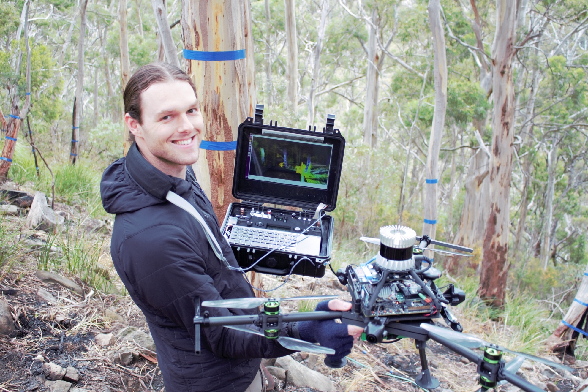 Centre for Forest Value PhD Candidate Sean Krisanski testing out his Unmanned Aerial Vehicle (UAV) or “drone” which will make it possible to collect forest canopy samples more safely, at a lower cost and at a much larger scale than existing canopy sample 