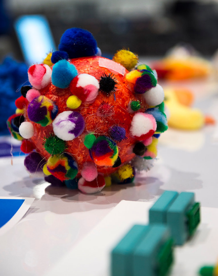 A model of a virus with its many surface proteins. Credit: Hynesite Photography &amp; Monash University. 