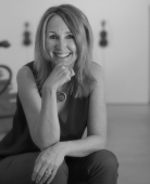 Professor Jill Bennett Black and white image—Professor Jill Bennett sitting down