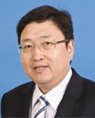 Formal headshot of Professor Shizhang Qiao