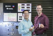 Image: Dr. Kevin Li and Prof. Eric May pictured in the lab with their separation technology.