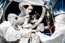 LIGO team members (left-to-right: Fabrice Matichard, Sheila Dwyer, Hugh Radkins) install in-vacuum equipment as part of the squeezed-light upgrade. Credit: Nutsinee Kijbunchoo/ANU LIGO team members (left-to-right: Fabrice Matichard, Sheila Dwyer, Hugh Radkins) install in-vacuum equipment as part of the squeezed-light upgrade. Credit: Nutsinee Kijbunchoo/ANU