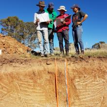 Undergraduate students examining the diversity of Brown Chromosol soil under pasture near Cowra, NSW (Photo by Prof. Budiman Minasny) Undergraduate students examining the diversity of Brown Chromosol soil under pasture near Cowra, NSW (Photo by Prof. Budiman Minasny)