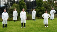 Researchers wearing PPE they developed Researchers wearing PPE