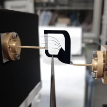 Experimentation with the multiplexer, showing connection to external systems. The multiplexer does not have any form of supporting substrate. Experimentation with the multiplexer, showing connection to external systems. The multiplexer does not have any form of supporting substrate.