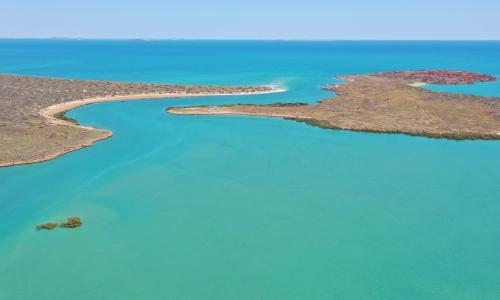 Westward facing aerial view of Cape Bruguieres Channel at high tide.  Credit: J. Leach