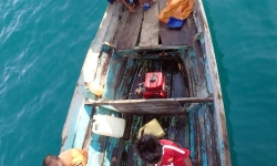 aerial view of children in boat