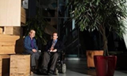 Image caption: The work of Professor Jock Collins, left, and Professor Simon Darcy is revealing how entrepreneurship can help people reach new heights.