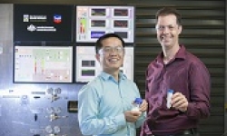 Image: Dr. Kevin Li and Prof. Eric May pictured in the lab with their separation technology.