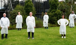 Researchers wearing PPE they developed Researchers wearing PPE