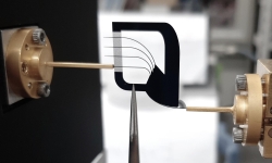 Experimentation with the multiplexer, showing connection to external systems. The multiplexer does not have any form of supporting substrate. Experimentation with the multiplexer, showing connection to external systems. The multiplexer does not have any form of supporting substrate.