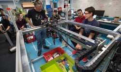 Image: Australian Centre for Robotic Vision director, QUT Professor Peter Corke with members of the Centre’s Amazon Picking Challenge team and Cartman, their Challenge winning robot. Image credit: Queensland University of Technology Image: Australian Centre for Robotic Vision director, QUT Professor Peter Corke with members of the Centre’s Amazon Picking Challenge team and Cartman, their Challenge winning robot. Image credit: Queensland University of Technology