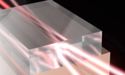 Image: Diamond beam combining amplifier: Three input beams intersect in the diamond efficiently transfer their power to a fourth input ‘seed’ beam. Image credit: Ondrej Kitzler. Image: Diamond beam combining amplifier: Three input beams intersect in the diamond efficiently transfer their power to a fourth input ‘seed’ beam. Image credit: Ondrej Kitzler.