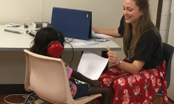 Image: Audiometry testing with resident of Yirrkala community by Madeleine Pearson, then Masters of Clinical Audiology student, Macquarie University. Image credit: Jessica Rom.