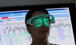 Image: ‘Re-Timer’ glasses radiates a soft, green UV-free light. Image Credit: Flinders University.