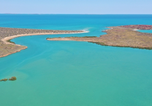Westward facing aerial view of Cape Bruguieres Channel at high tide. Credit: J. Leach