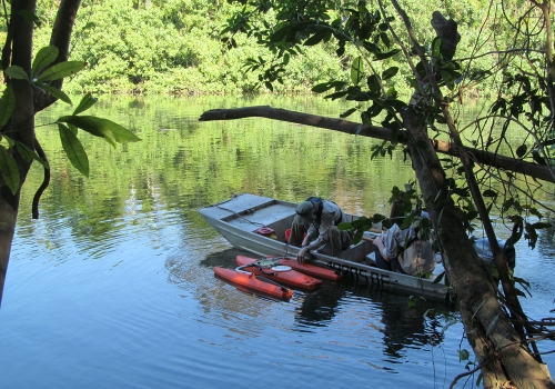 DES Water Quality & Investigations (WQI) team members on the Mulgrave River.