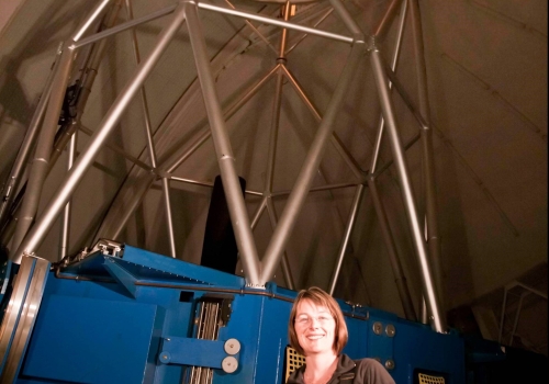 Image: Associate Professor d’Orgeville in front of the Gemini South 8-metre telescope in Chile, during first light propagation of the Gemini South laser using old solid state laser technology (2011) Image credit: Gemini Observatory. Image: Associate Professor d’Orgeville in front of the Gemini South 8-metre telescope in Chile, during first light propagation of the Gemini South laser using old solid state laser technology (2011) Image credit: Gemini Observatory.