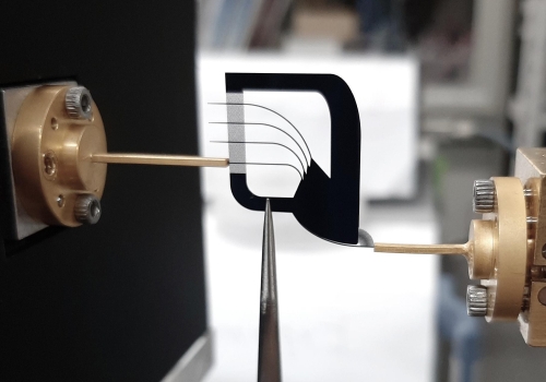 Experimentation with the multiplexer, showing connection to external systems. The multiplexer does not have any form of supporting substrate. Experimentation with the multiplexer, showing connection to external systems. The multiplexer does not have any form of supporting substrate.