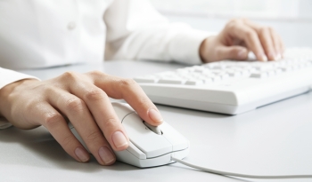 hands on computer mouse and keyboard