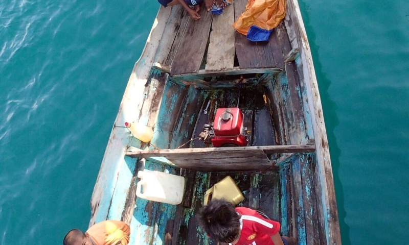 aerial view of children in boat