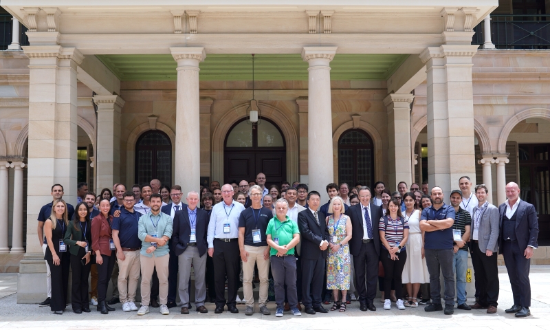 A large group of researchers, industry partners and stakeholders gathered outside Old Government House, posing for a group photo following a joint biomechanics event.